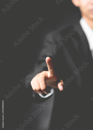 businessman gesture showing with the touch of a finger