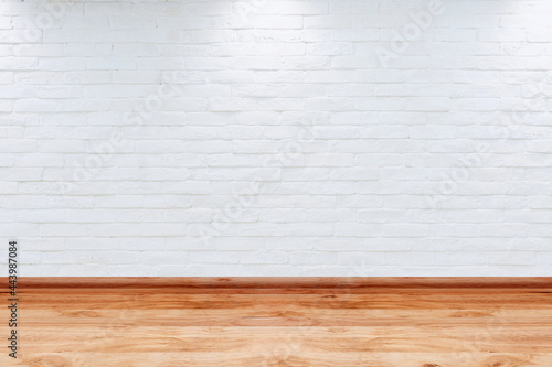 Room interior vintage with white brick wall and wood floor texture for design artwork.