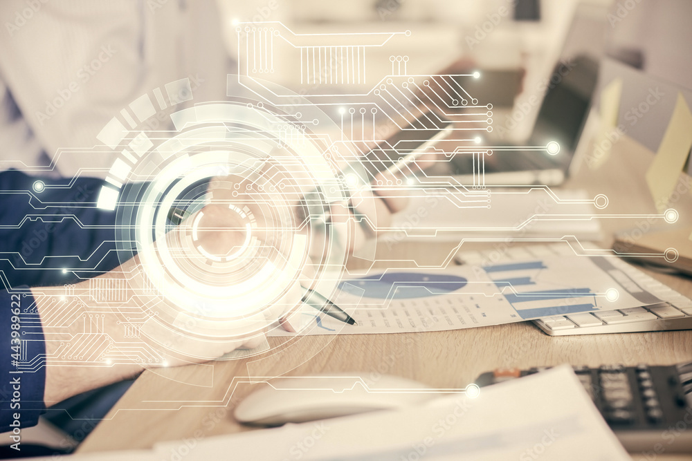 Double exposure of man's hand holding and using a digital device and data theme hologram drawing. Technology concept. Double exposure of man's hand holding and using a digital device and data theme hologram drawing. Technology concept.