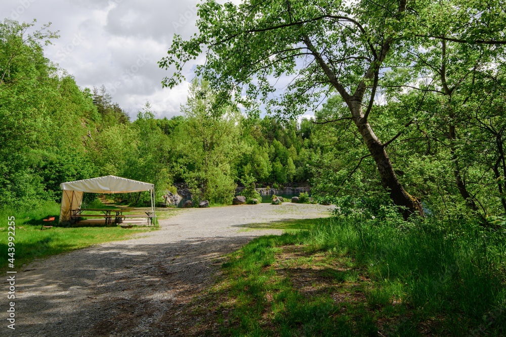 Sitting by an old flooded quarry. Bathing. The village of Vykleky. Central Moravia. Europe. Sitting by an old flooded quarry. Bathing. The village of Vykleky. Central Moravia. Europe.