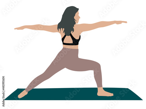 Beautiful sporty fit woman practices Ashtanga Vinyasa Yoga asana Virabhadrasana 2 - warrior pose 2 isolated on white photo