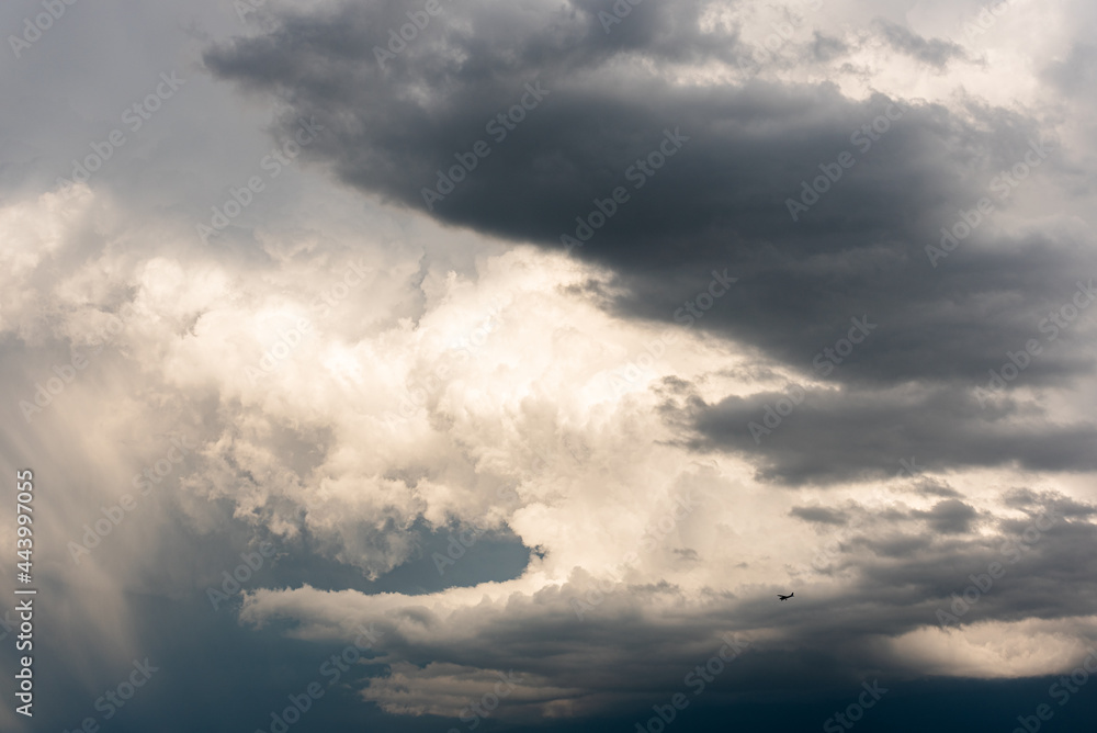 huge storm cloud, tower cumulus and cumulonimbus cloud, develop over Alp mountains