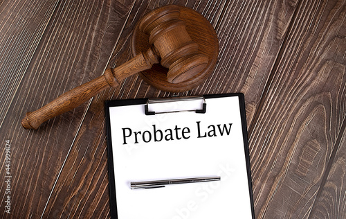 PROBATE LAW text on paper with gavel on wooden background