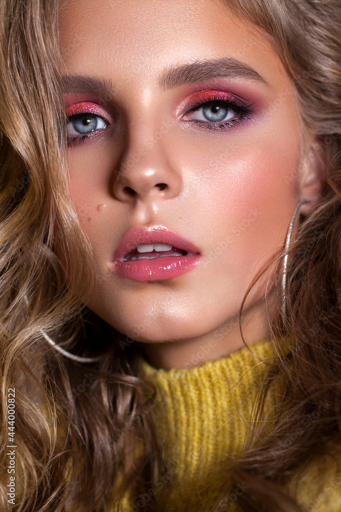 young model with professional make up and blond hair young model with professional make up and blond hair