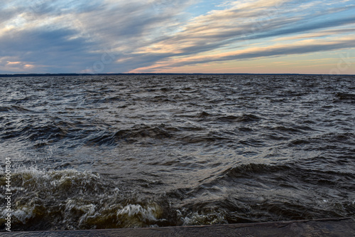 beautiful sunset and waves on the Volga River © Igor