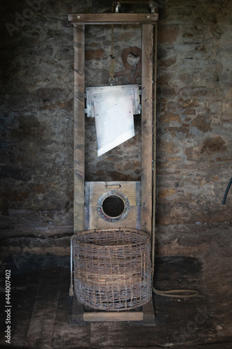 Real size working historic Guillotine made from wood and blade photo