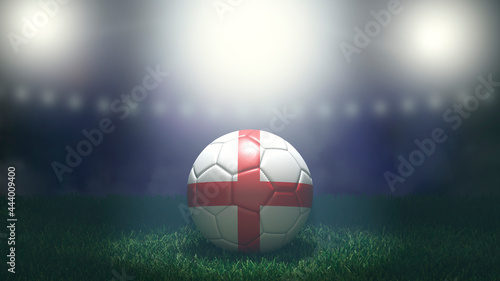 Quadro em tela Soccer ball in flag colors on a bright blurred stadium background