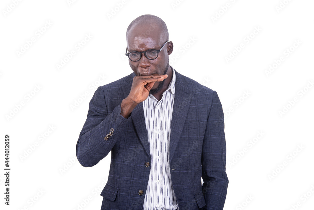 portrait of a young businessman yawning. portrait of a young businessman yawning.
