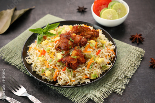 Chinese fried rice and chilly chicken curry Chicken fried rice with vegetables fried eggs basmati grain very popular food in restaurants Kerala Mumbai India Sri Lanka china