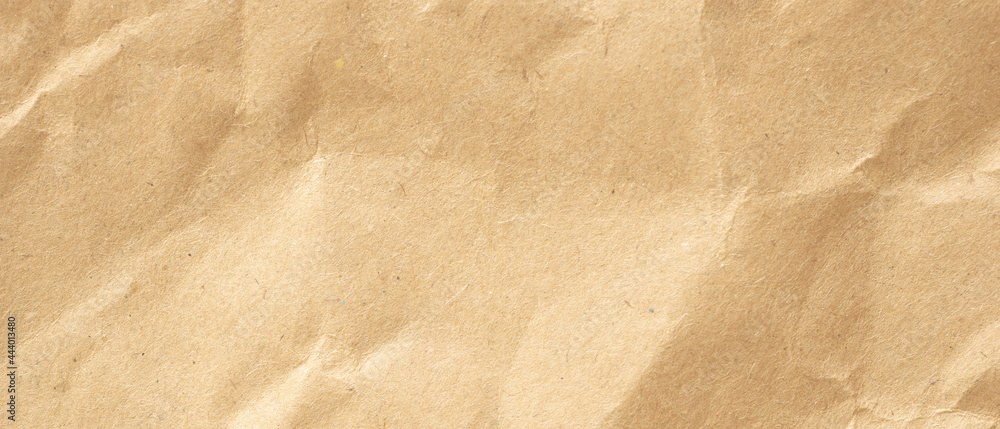 Naklejka premium crumpled paper texture background, real cardboard pattern