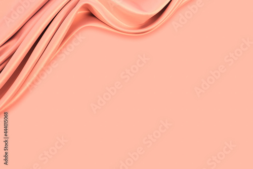 Beautiful elegant wavy light pastel orange peach satin silk luxury cloth fabric texture with monochrome background design. Copy space