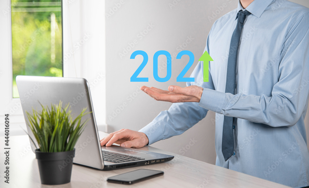 Business development to success and growing growth year 2021 concept.Plan business growth graph in year 2021 concept.Businessman plan and increase of positive indicators in his business. Business development to success and growing growth year 2021 concept.Plan business growth graph in year 2021 concept.Businessman plan and increase of positive indicators in his business.