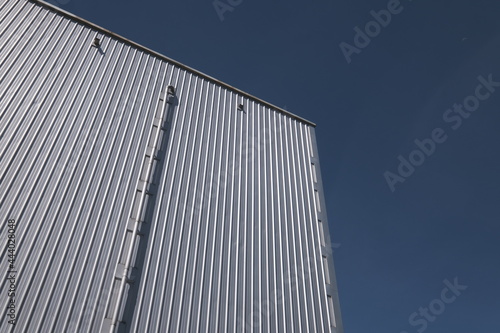Corrugated structure soars into blue sky