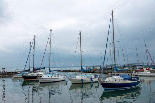 boats moored in the marina on a stormy summer day