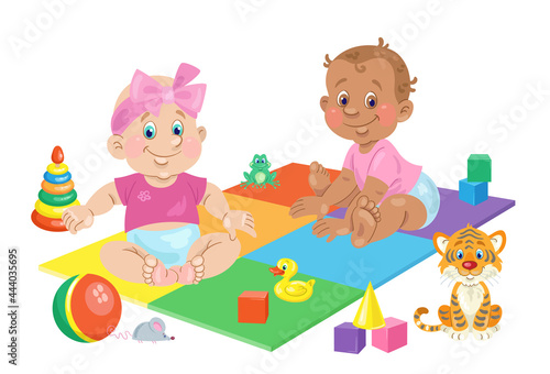 Two cute toddlers are sitting on a colorful play mat surrounded by toys. A boy and a girl of different skin colors. In  cartoon style. Isolated over white background. Vector illustration.