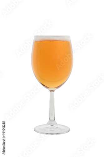 Glass glass filled with beer with foam and bubbles, close-up on a white background