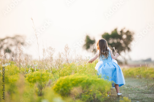 Kid outside exploring childhood and nature