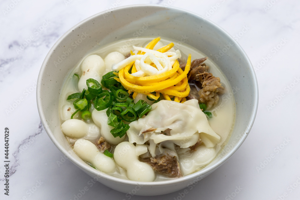 Korean style rice cake soup which is called Jolaeng-i Ddukkuk eats on the Lunar moon new year Korean style rice cake soup which is called Jolaeng-i Ddukkuk eats on the Lunar moon new year