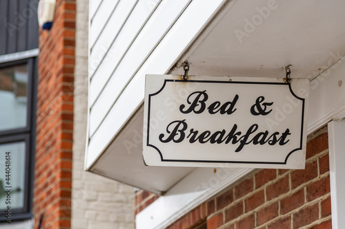 A sign hanging outside an english bed and breakfast