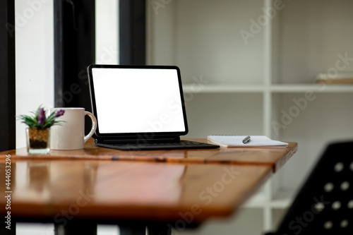 Wallpaper Mural Workplace concept, Mockup blank screen tablet with blank white screen in office modern. Torontodigital.ca