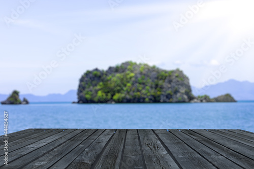 Fototapeta Naklejka Na Ścianę i Meble -  Table on top in front of the white beach, background for plain text or products. Summer exotic mockup, boards product display, montage and presentation