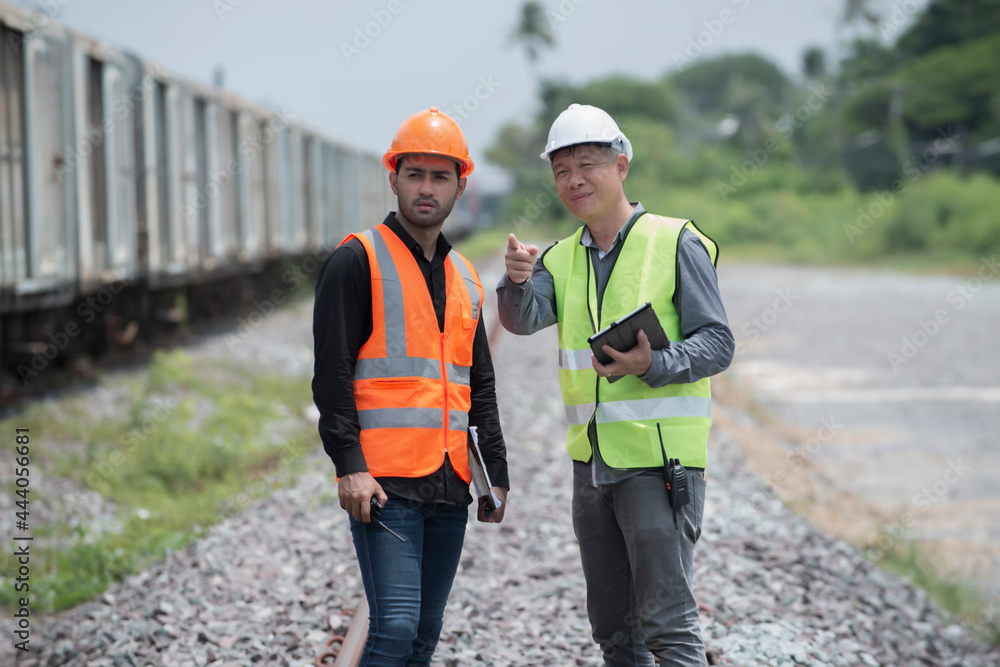 engineer discuss job on construction site. consultant and contractor inspection railway onsite construction.