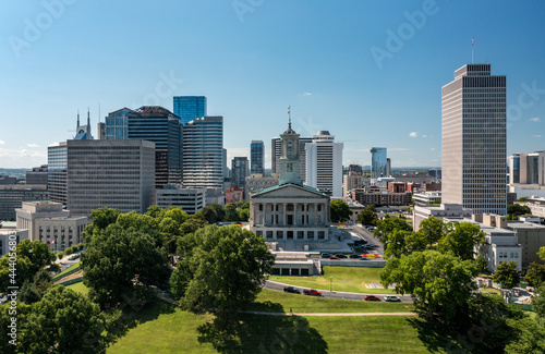 Aerial drone view of the Tennessee state capitol building in Nashville with the business district