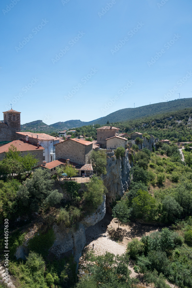 Aerial view of Puentedey on a sunny day, a beautiful village in Burgos, Merindades, Spain, Europe