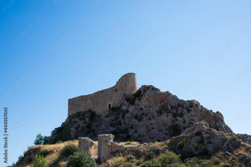 View from below of Las Rojas Castle, on top of a hill at Poza de la Sal, Merindades, Burgos, Spain, Europe View from below of Las Rojas Castle, on top of a hill at Poza de la Sal, Merindades, Burgos, Spain, Europe