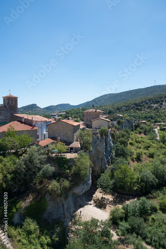Aerial view of Puentedey on a sunny day, a beautiful village in Burgos, Merindades, Spain, Europe