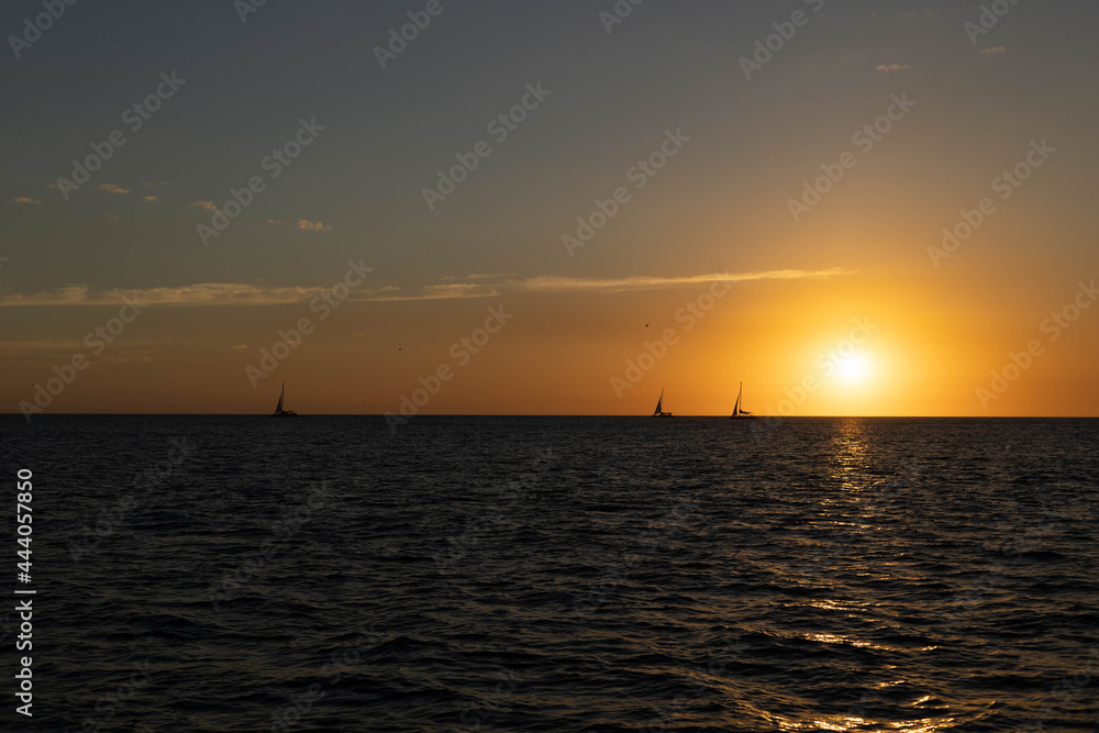 sailboat on sunset
