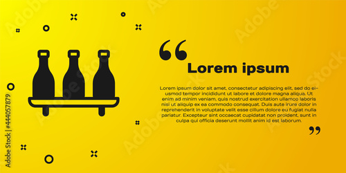 Black Bottle of wine icon isolated on yellow background. Wine varieties. Vector