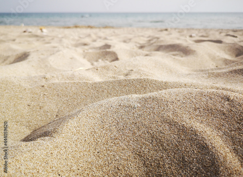 Sand on the beach and sea view.  Nature background with empty copy space. Minimalist backdrop