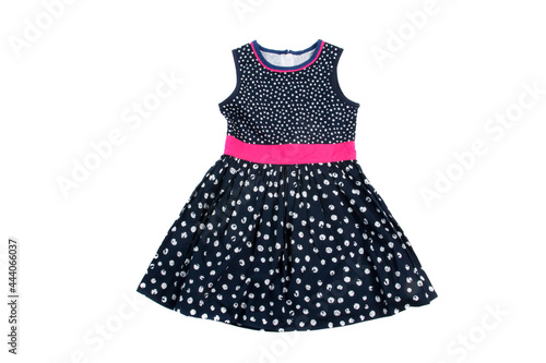 Elegant light children summer dress. Black dress on white dots