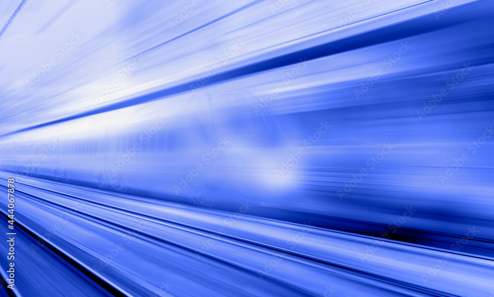 White high speed train runs on rail tracks -Train in motion White high speed train runs on rail tracks -Train in motion