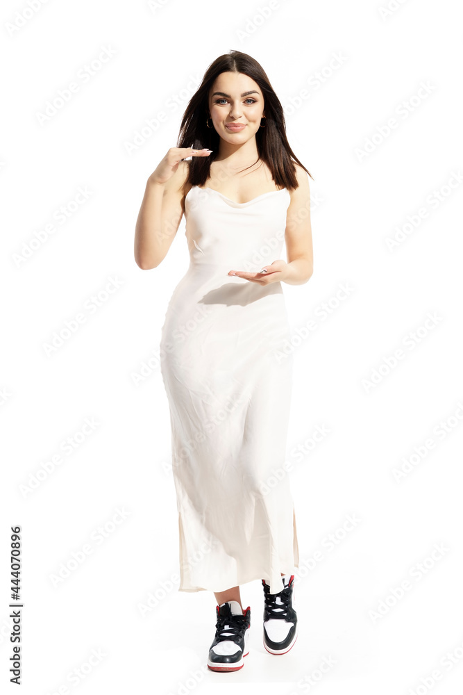 Beautiful young black hair woman in white dress framing copy space advertising empty space. Full body portrait isolated on white background Beautiful young black hair woman in white dress framing copy space advertising empty space. Full body portrait isolated on white background