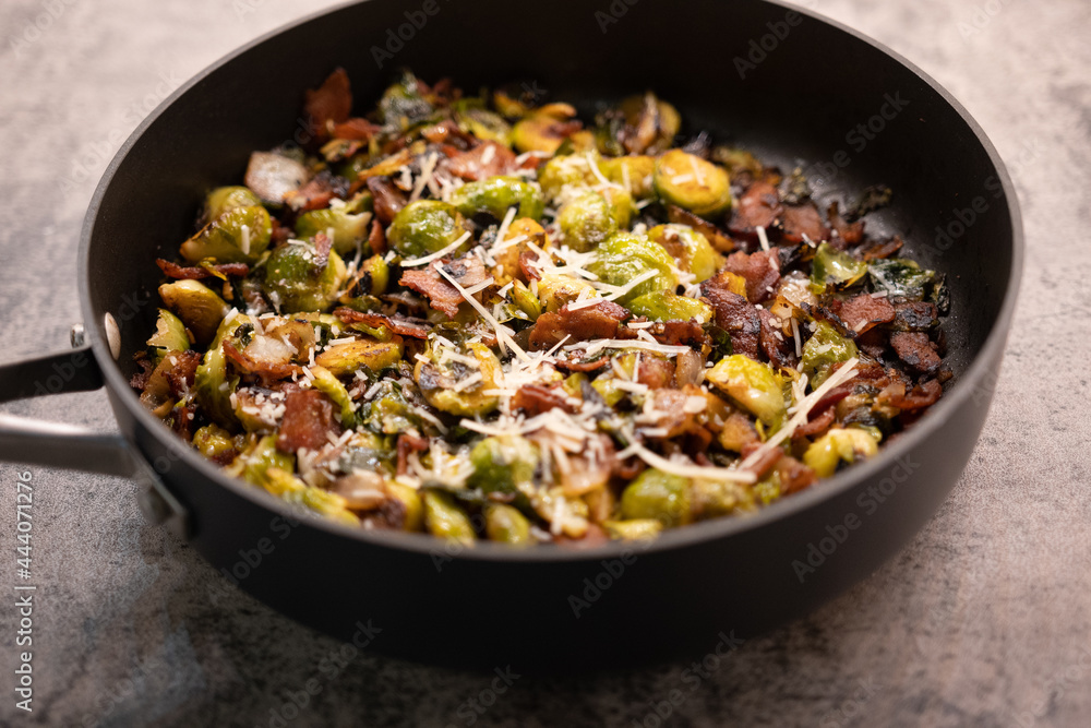 Frying Pan Full of Brussels Sprouts with parmesan and bacon Frying Pan Full of Brussels Sprouts with parmesan and bacon