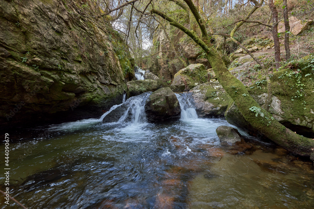 Small waterfall formed by the river Teo in the area of Galicia, Spain.