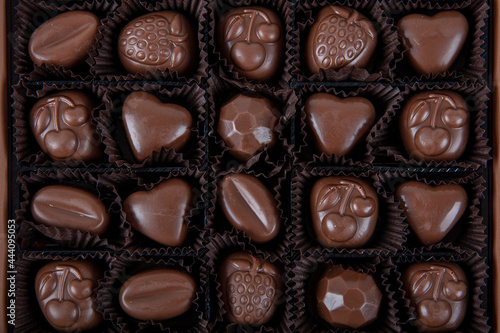Special chocolate. Close-up view of box of chocolates, view from above. Gift chocolate.