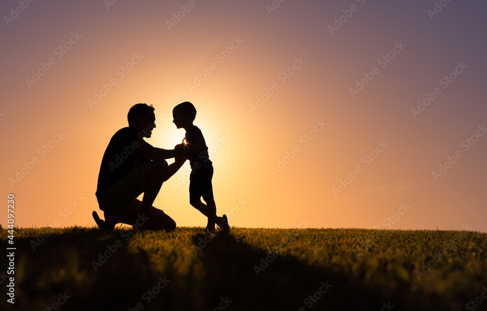Happy father son moment silhouette. Fatherhood, and childhood concept. 