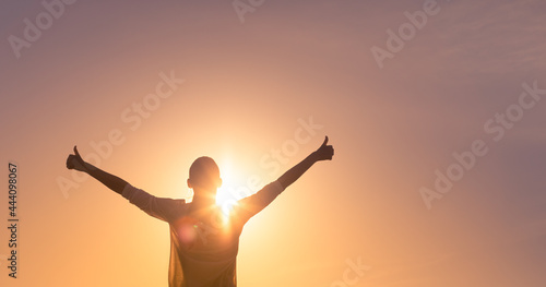 Happy woman with thumbs up having healthy state of mind 