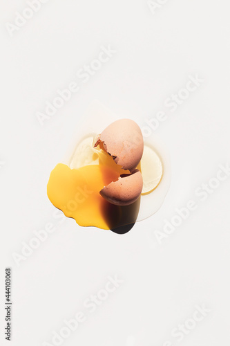 a broken egg in a white background