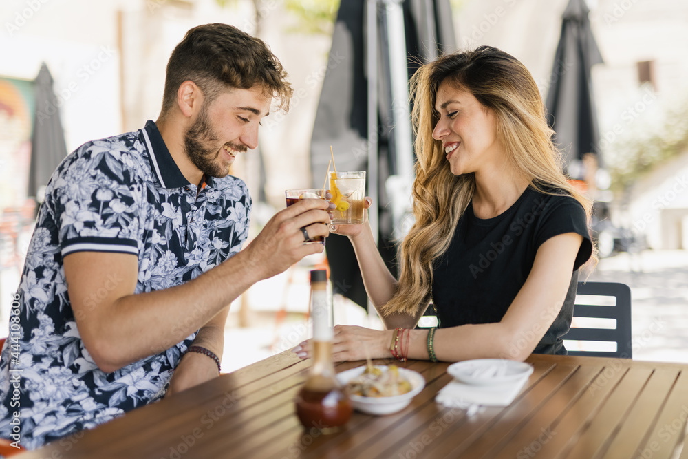 couple making vermouth in the bar couple making vermouth in the bar