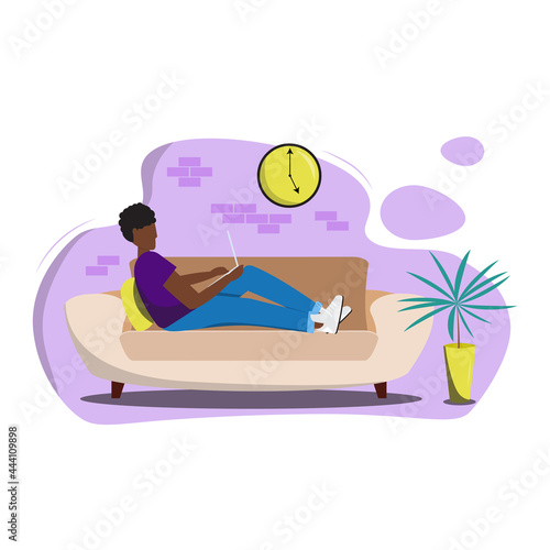 African male character sitting on the couch with a laptop and working in the living room. Man sitting with knees up on couch and using laptop. Working from home. Freelance and remote working concept.