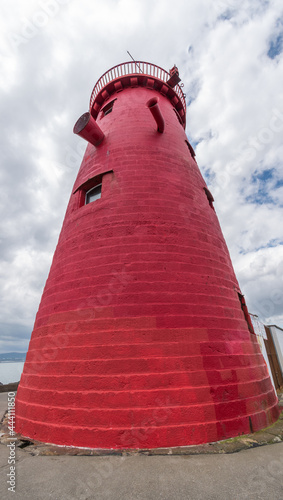 Canvas Print Red Poolbeg lighthouse at Dublin bay entrance.