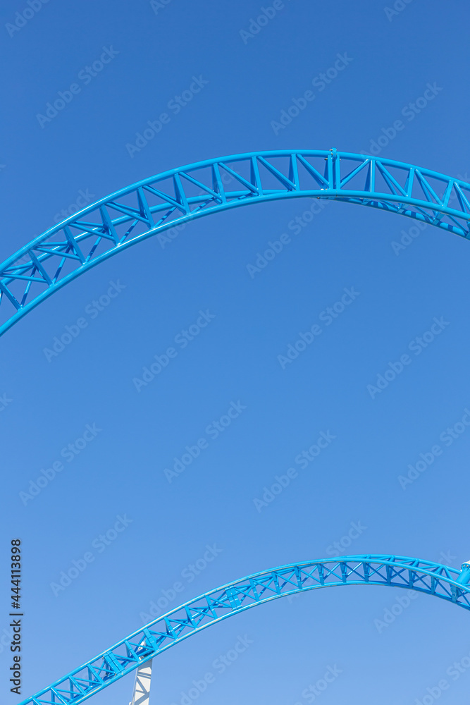 Fototapeta premium rollercoaster rails against blue sky