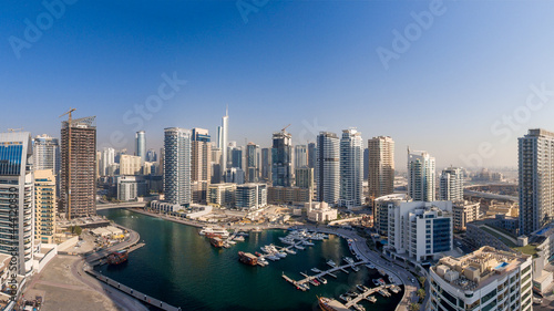 DUBAI, UAE - DECEMBER 5, 2016: Aerial view of Marina buildings. Dubai attracts 15 million people annually © jovannig