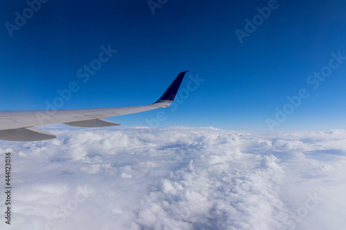 Wing aircraft in altitude during flying above the clouds