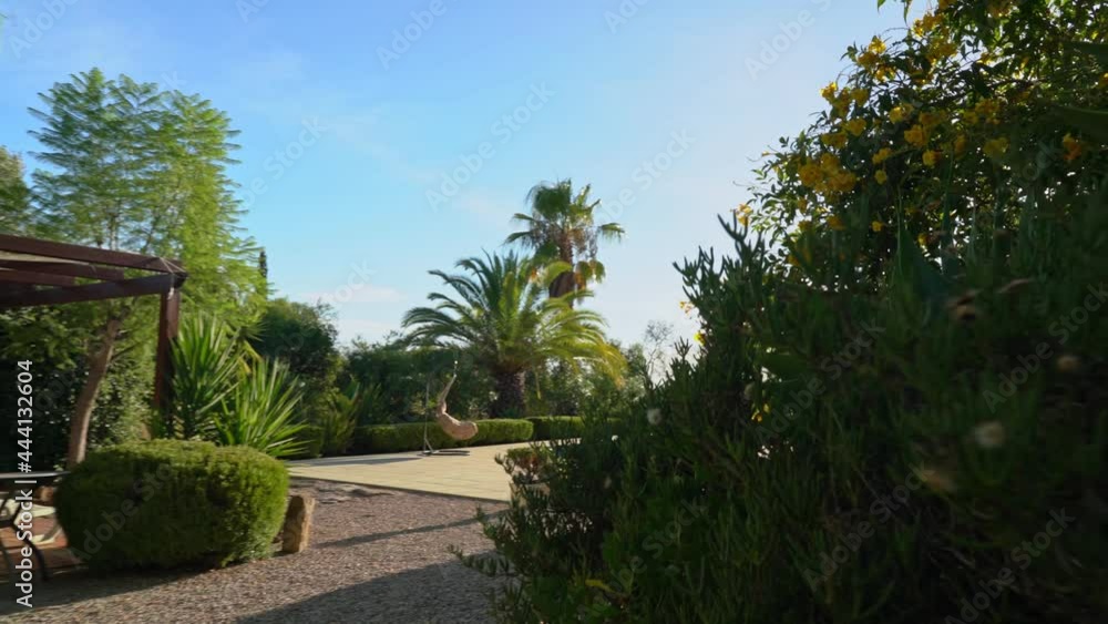 Walking forward through the garden, a contemporary traditional European luxury villa with a wide stylish pool. For the rest of tourists. Walking forward through the garden, a contemporary traditional European luxury villa with a wide stylish pool. For the rest of tourists.