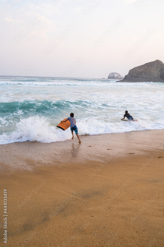surfing on the beach